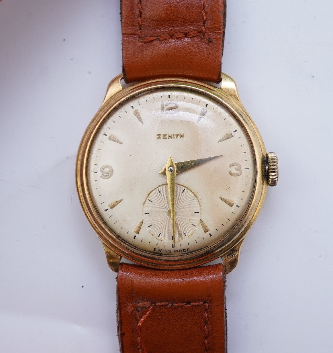 A gentleman's 1950's 18ct gold Zenith manual wind wrist watch